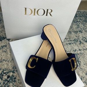 Brand new Christian Dior navy blue velvet slides heels. Never worn. NWT